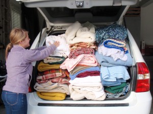 Stephanie Knutson helps to Blanket Orange County